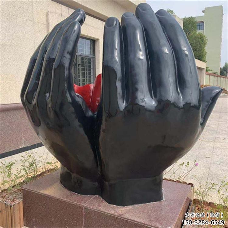 火球雕塑選用，美陳雕塑，鑄銅手托火球雕塑廠家