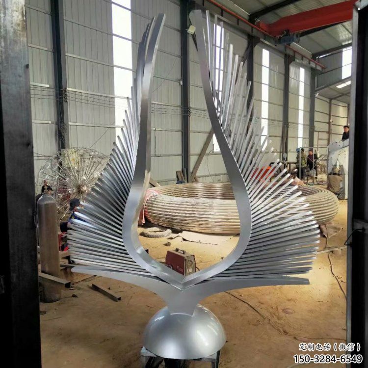 步行街翅膀雕塑，鍛造景觀雕塑，鏤空方式